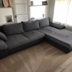 This is a photo of a grey L shape sofa that has been professionally steam cleaned, also the beige carpets have been steam cleaned too works carried out by Beddington Carpet Cleaning