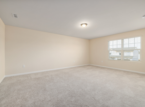 This is a photo of an empty room with cream carpets works carried out by Beddington Carpet Cleaning